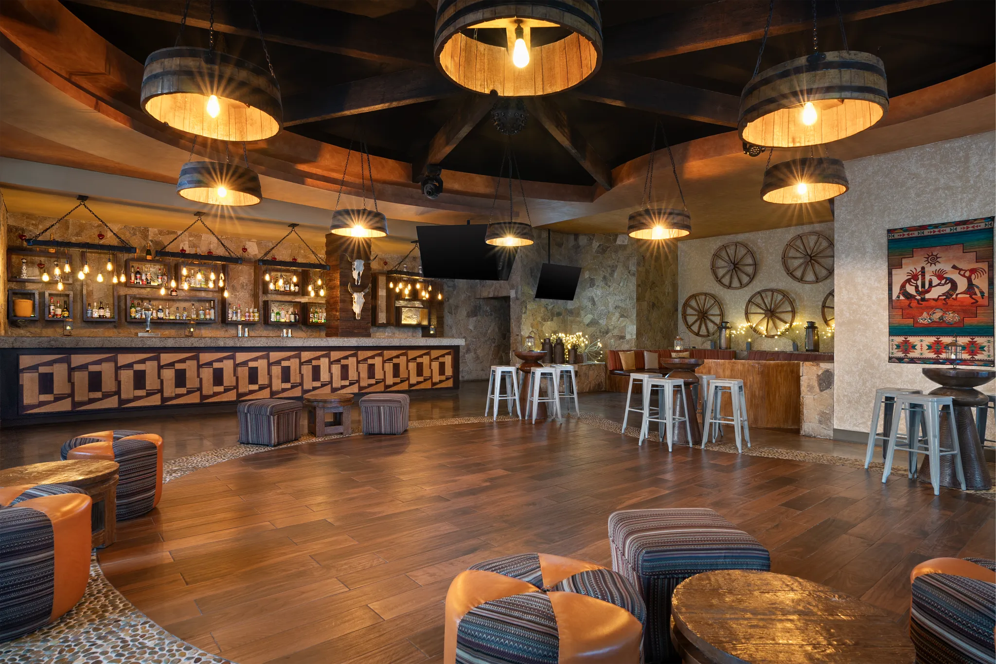 Desires Dance and Sports Bar at Secrets Puerto Los Cabos featuring a lively dance floor, DJ booth, and modern lounge with flat-screen TVs.