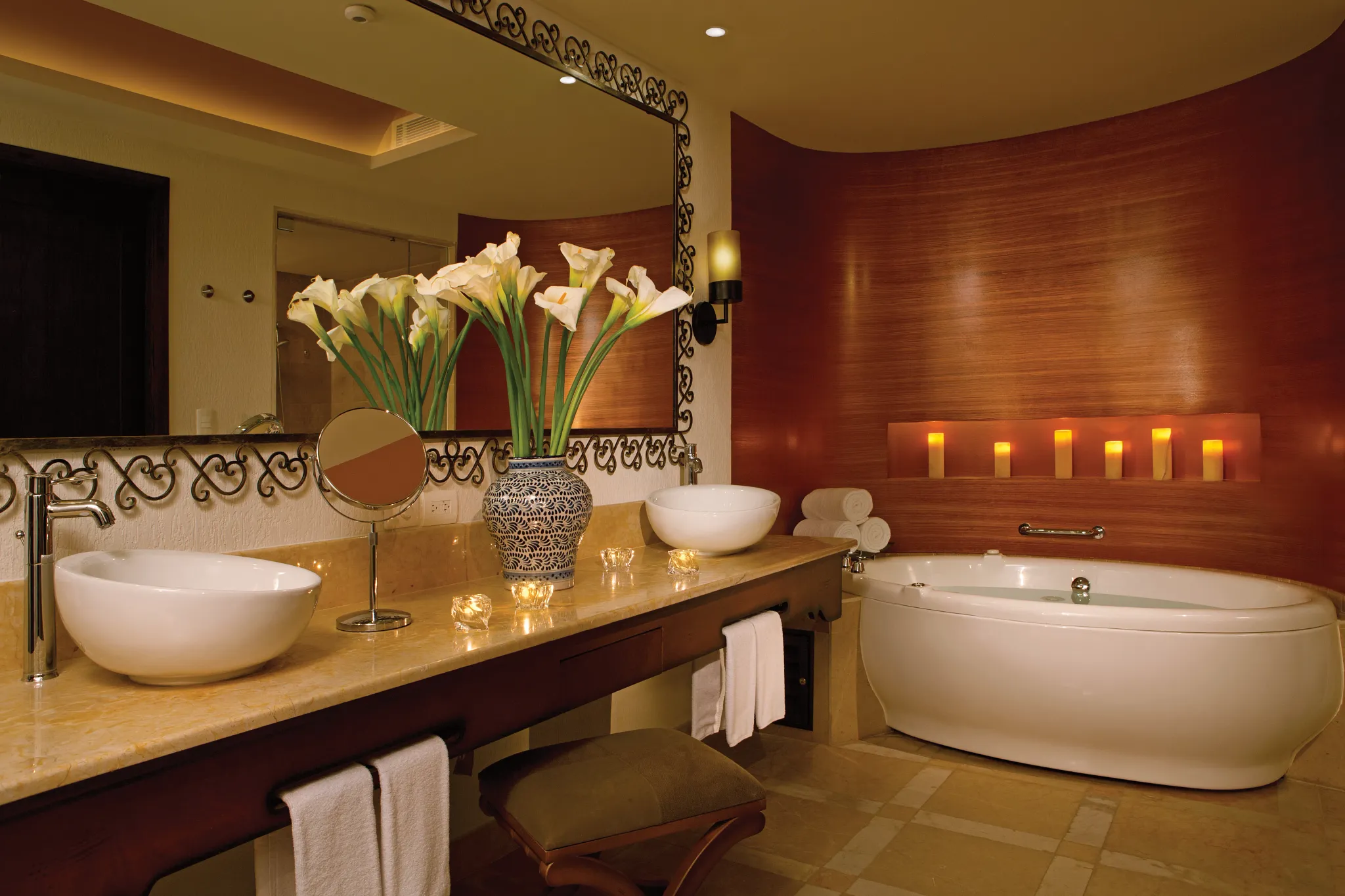 Master Suite Swim Out Ocean Front bathroom with dual sinks and soaking tub at Secrets Puerto Los Cabos Golf & Spa Resort.