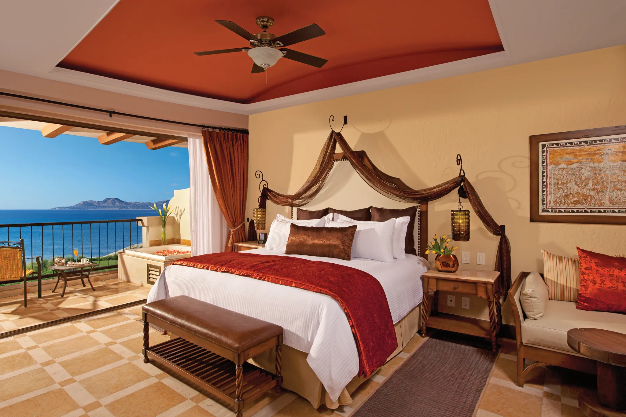 Preferred Club Junior Suite Ocean Front with king bed and oceanfront balcony at Secrets Puerto Los Cabos Resort.